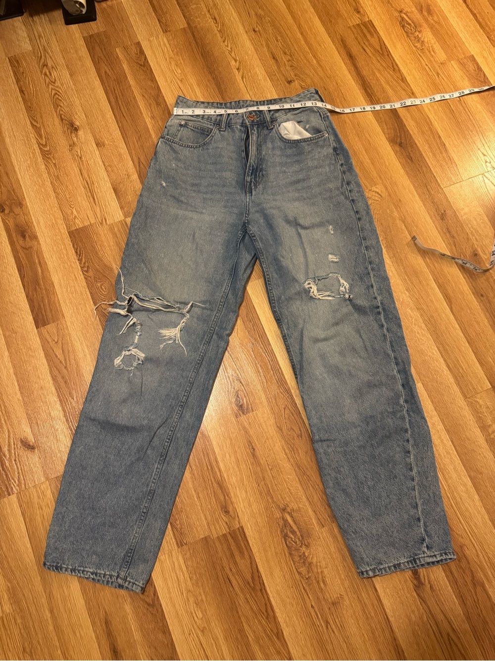 High-Rise Distressed Light Blue Denim Jeans